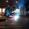 A man at work welding